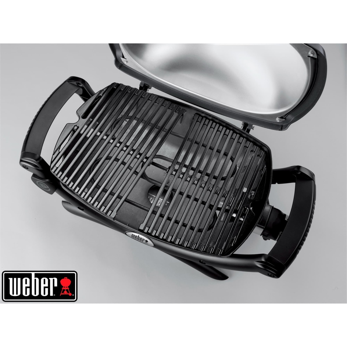 Barbacoa eléctrica Weber negra abierta vista superior.