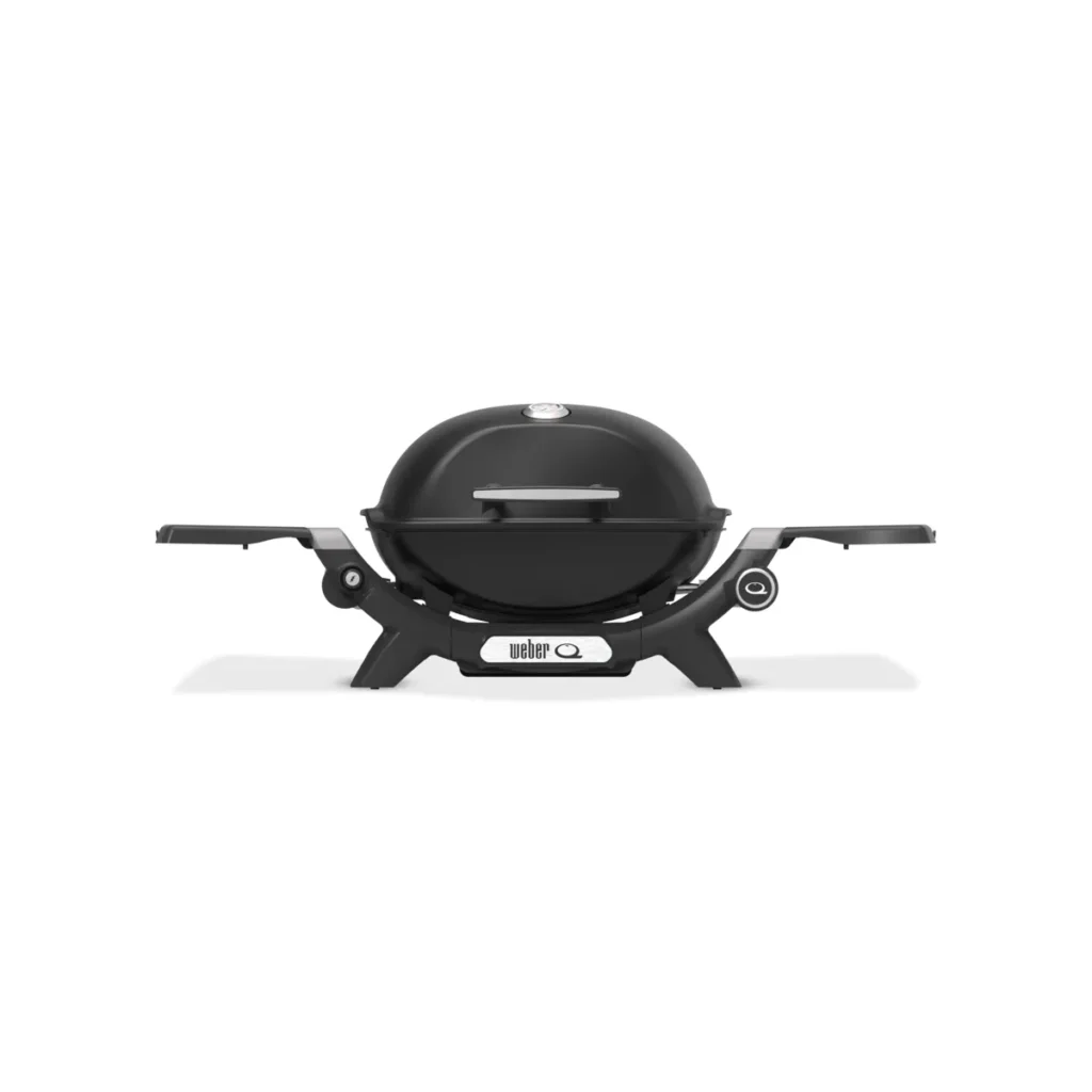 Parrilla portátil negra con asas plegables.