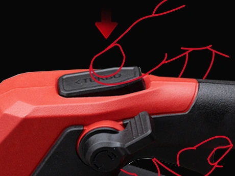 Detalle de botón en herramienta eléctrica roja