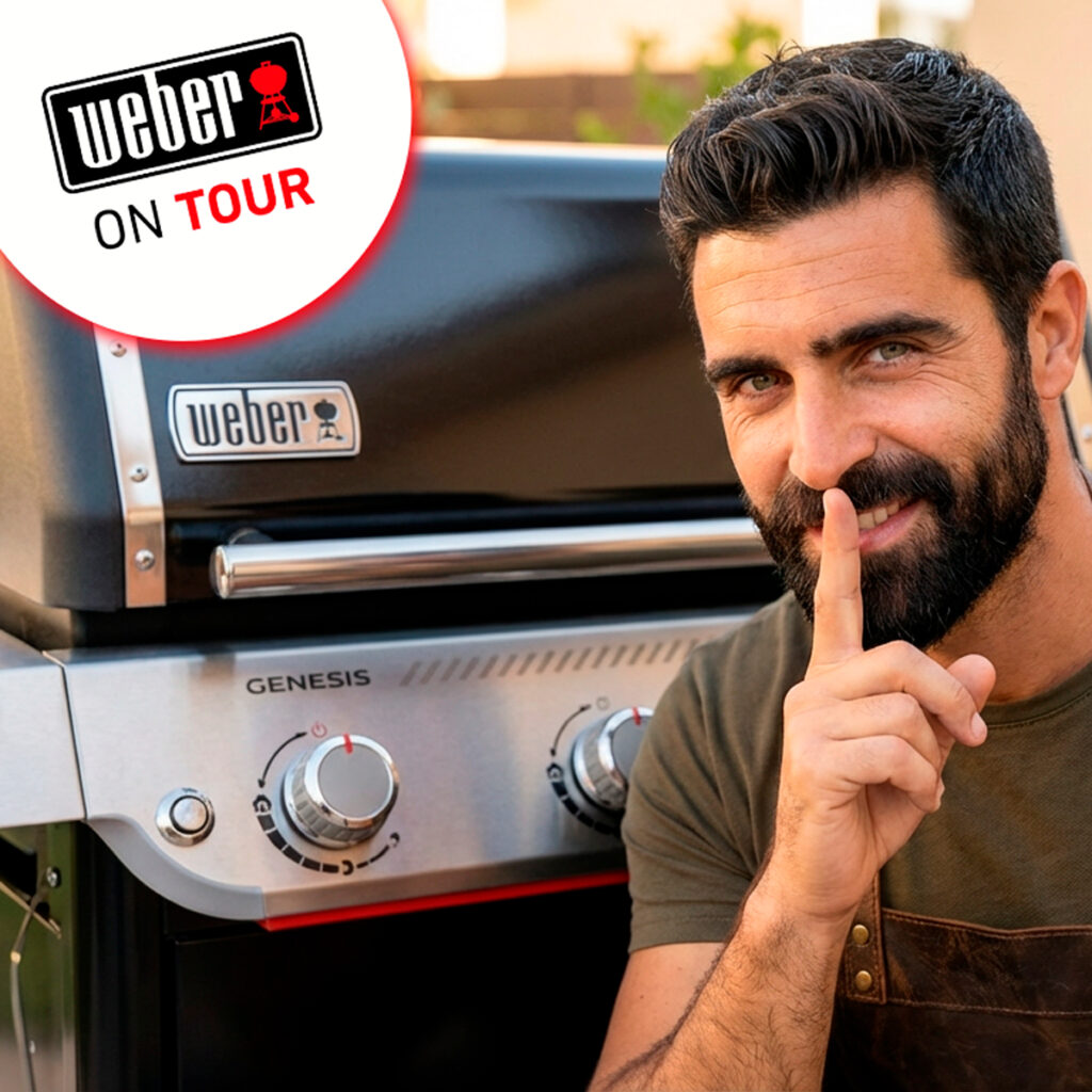 Hombre junto a barbacoa Weber Genesis